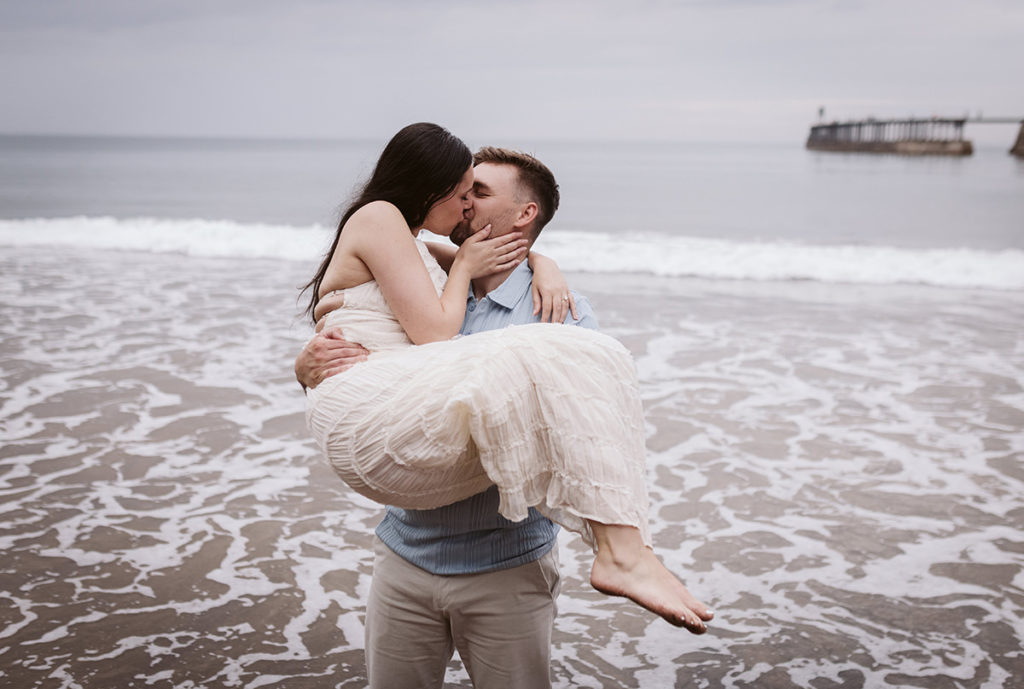 A relaxed pre-wedding shoot on the beach at Whitby