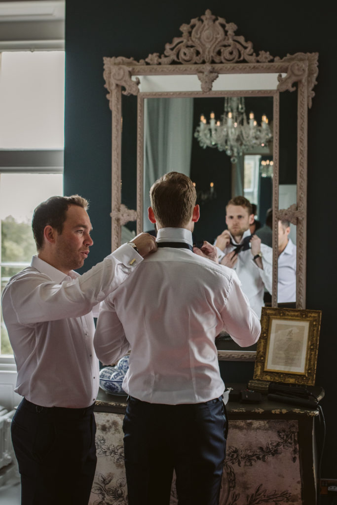 Groom getting ready at Thicket Priory wedding venue
