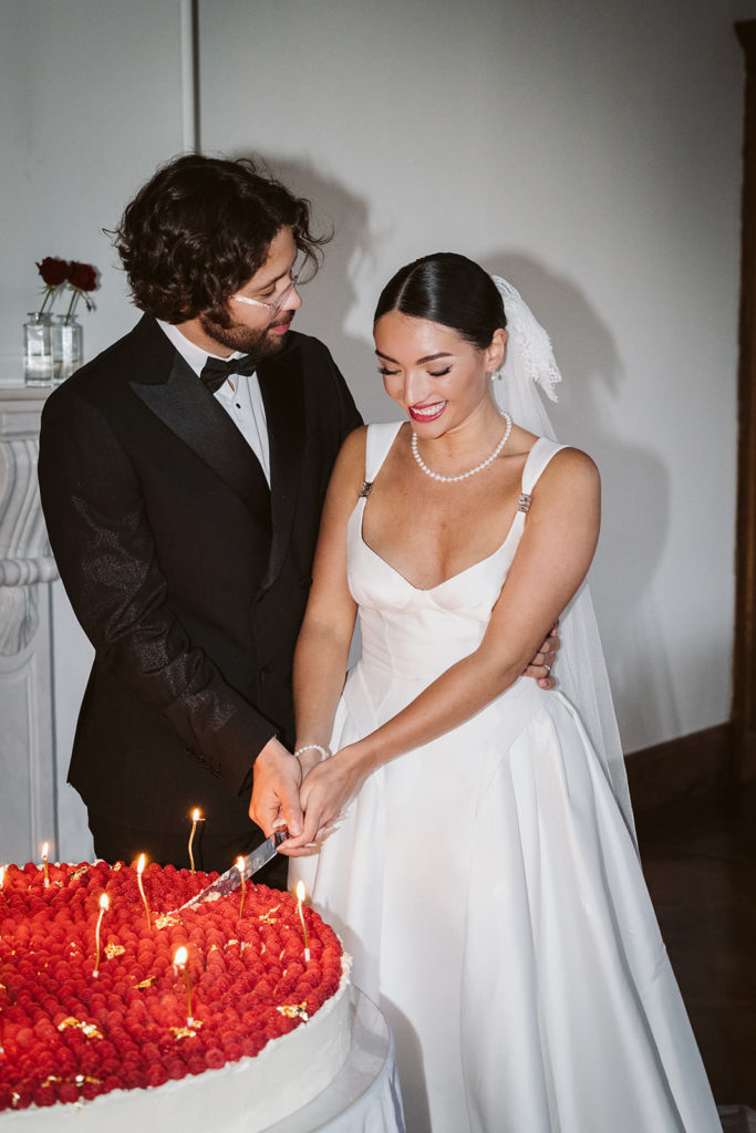 The happy couple cutting their incredible cake