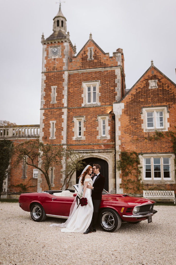 Candid wedding moment outside Thicket Priory near York