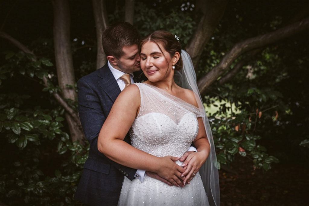 Natural couple portraits at Rudding Park during a summer wedding in Harrogate