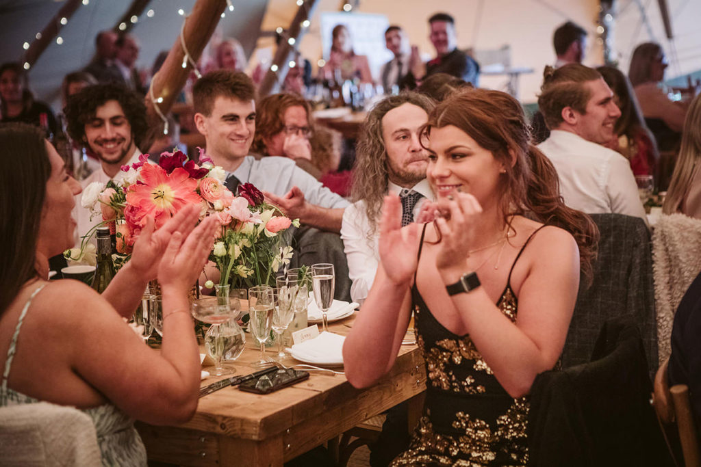 Guests laughing during relaxed Yorkshire wedding reception