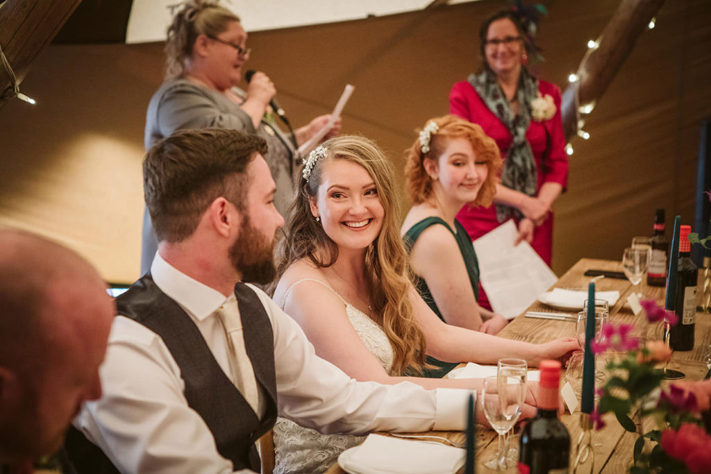 Candid wedding moments during speeches at Skipbridge Country Weddings