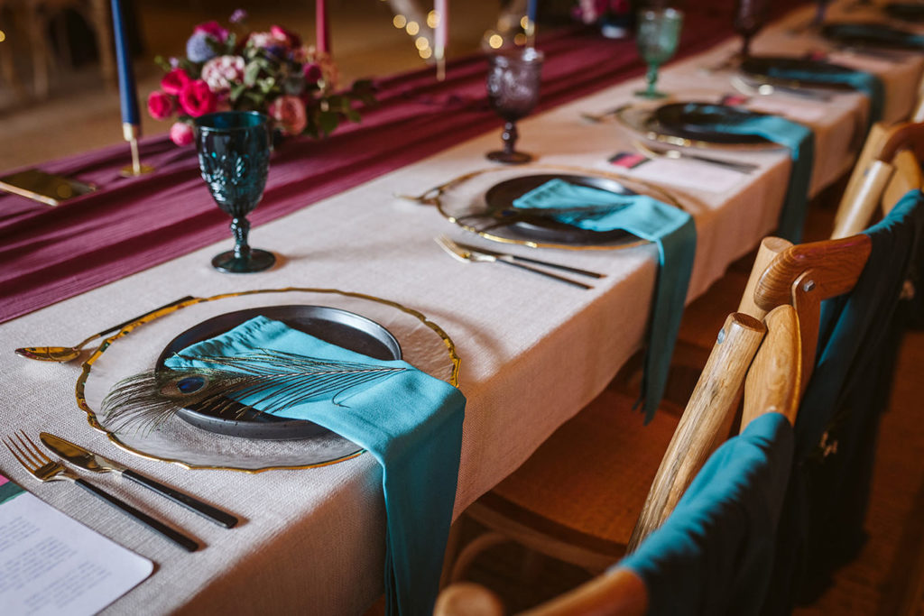 Tipi wedding decorated with bright jewel toned autumn colours