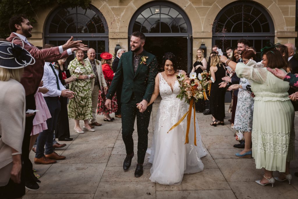 A confetti throw outside the Fig House, Middleton Lodge