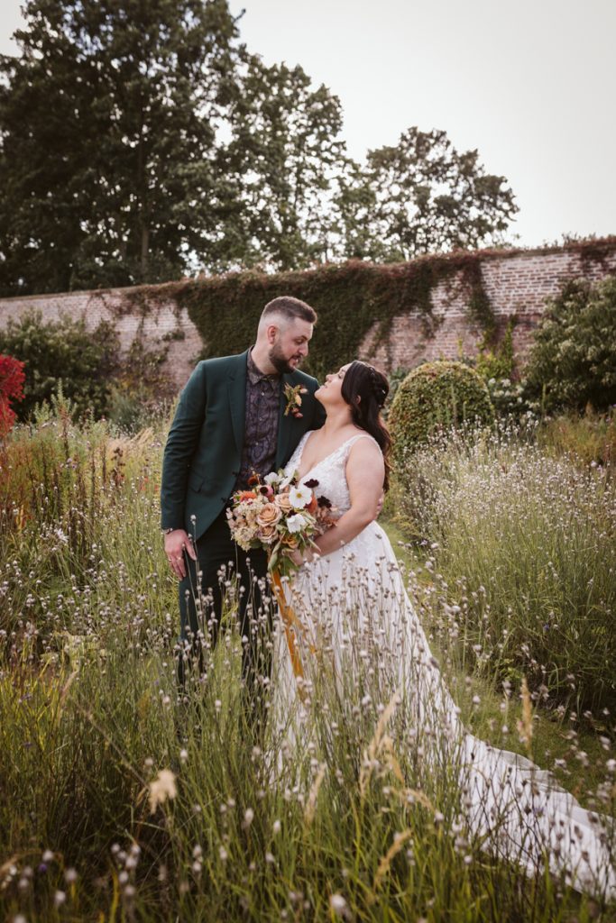A portrait of the Bride and Groom in the Walled Garden of the Fig House, Middleton Lodge