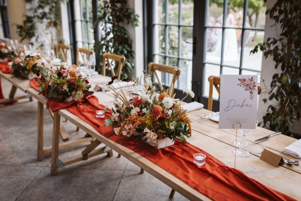 The top table at the fig house with flowers by Emma Cox Floristry