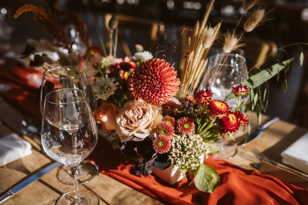 Table flowers by Emma Cox Floristry at this Fig House wedding