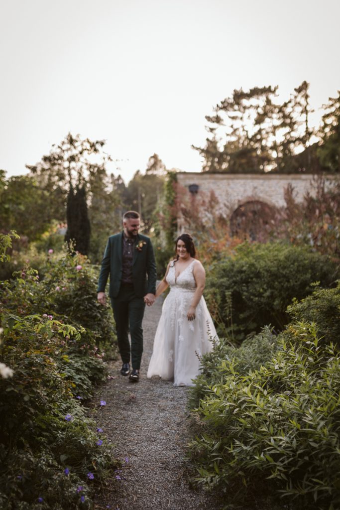 A portrait of the Bride and Groom in the Walled Garden of the Fig House, Middleton Lodge