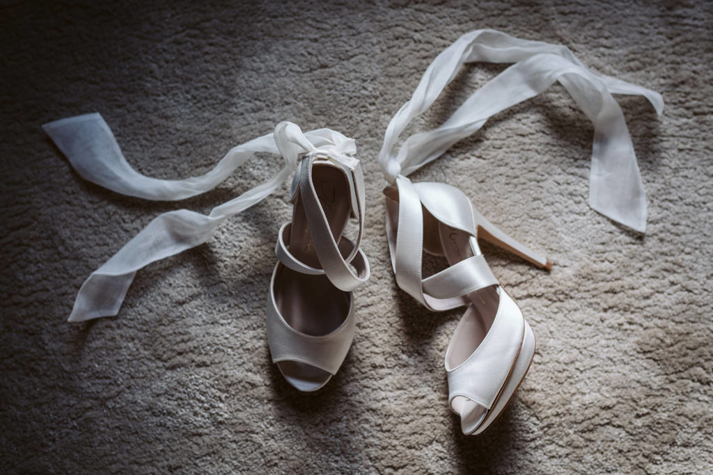 Bridal shoes by Harriet Wilde during getting ready at Le Petit Chateau