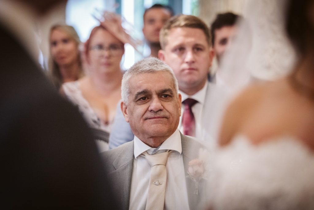 Father of the Bride during the ceremony at Le Petit Chateau