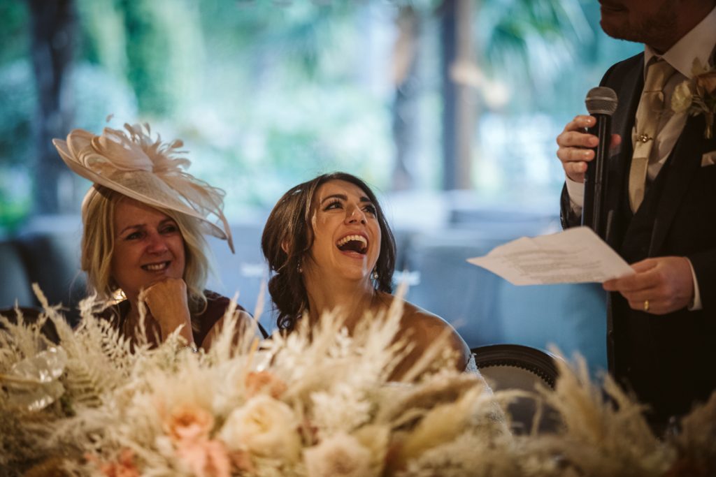 the Brides reaction during speeches at Le Petit Chateau 