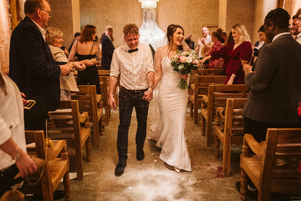 The happy couple walking back down the aisle - Runa Farm weddings - Hannah Brooke Photography