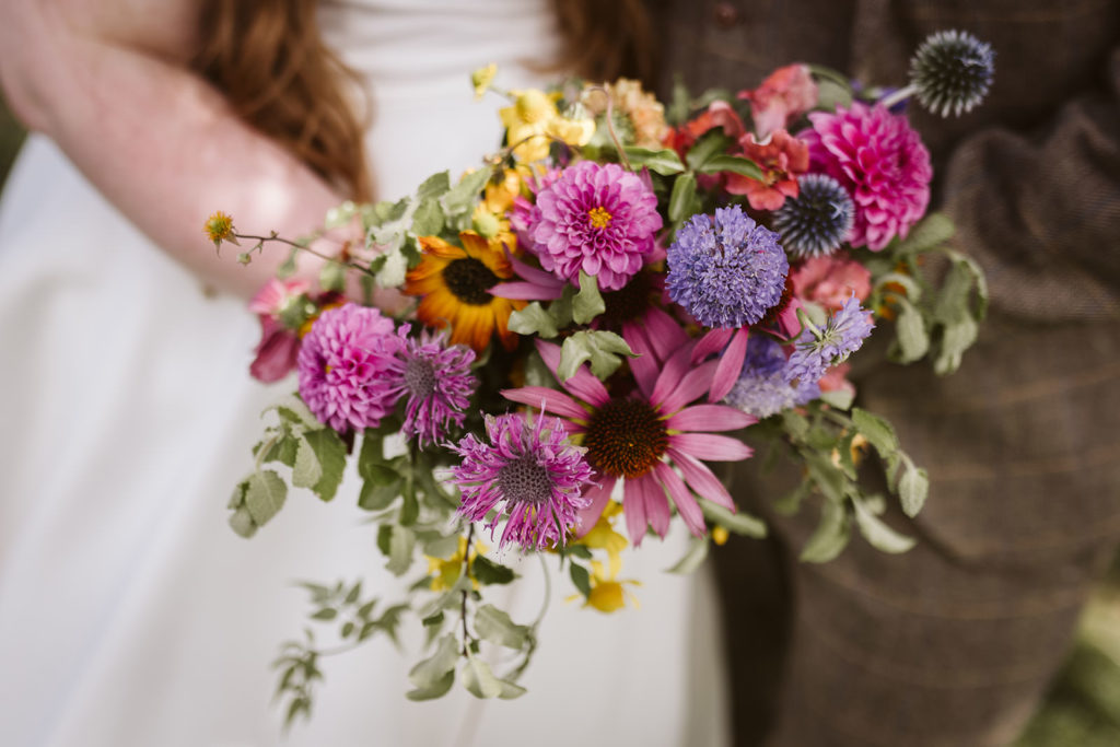 Stunning colourful wedding bouquet in pinks, purples and yellows