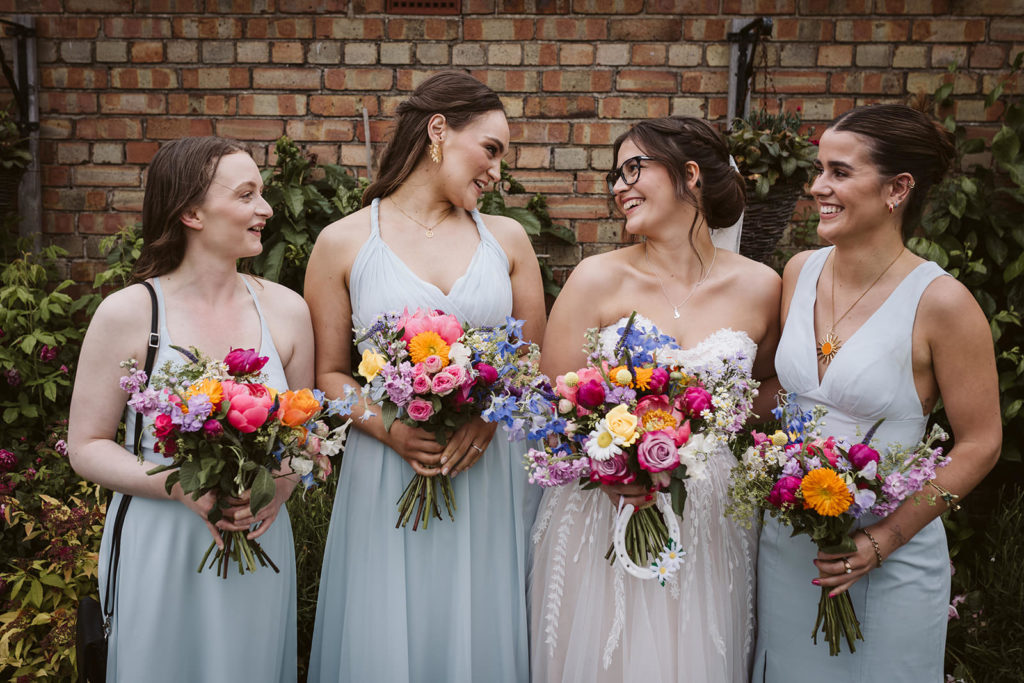 Bridesmaids and beautiful blooms at Antonia & Ben's Beverley Barn Wedding