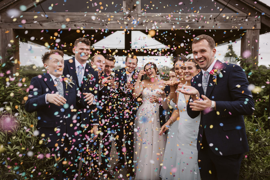 Natural laughter during the confetti moments at The Beverley Barn