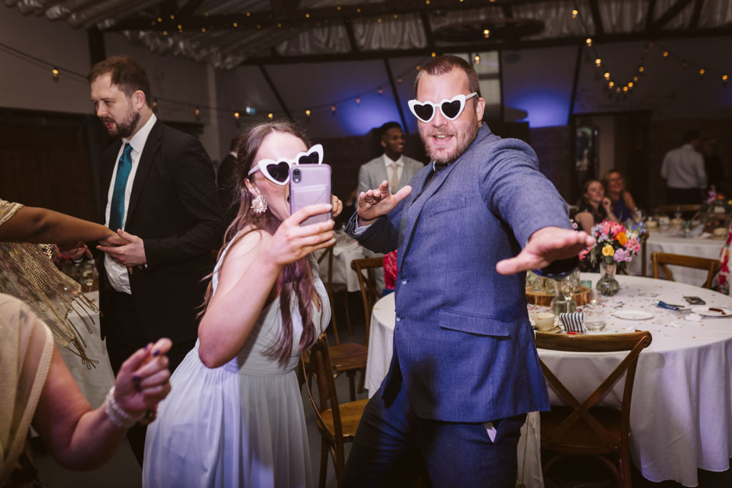 Guests having fun on the dancefloor at the Beverley Barn