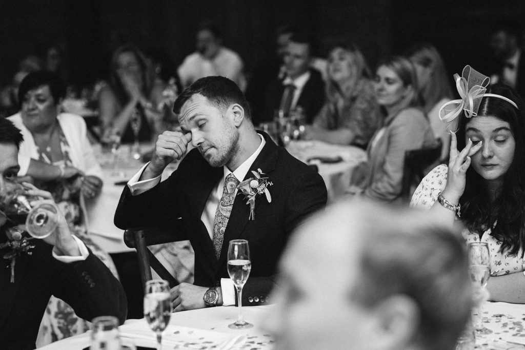 Guests looking emotional during the Groom's speech