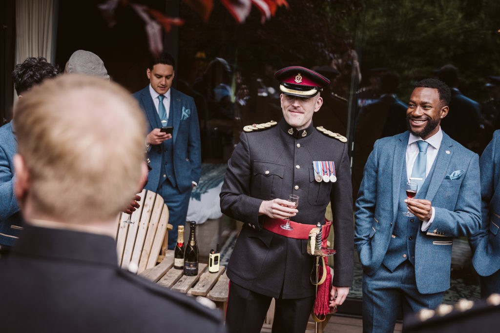 Groom and groomsmen enjoying a pre-wedding drink