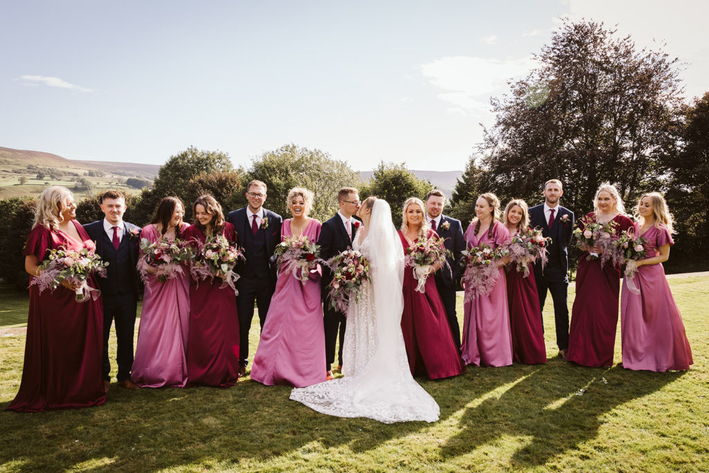 A full bridal party shot at the Saddle Room
