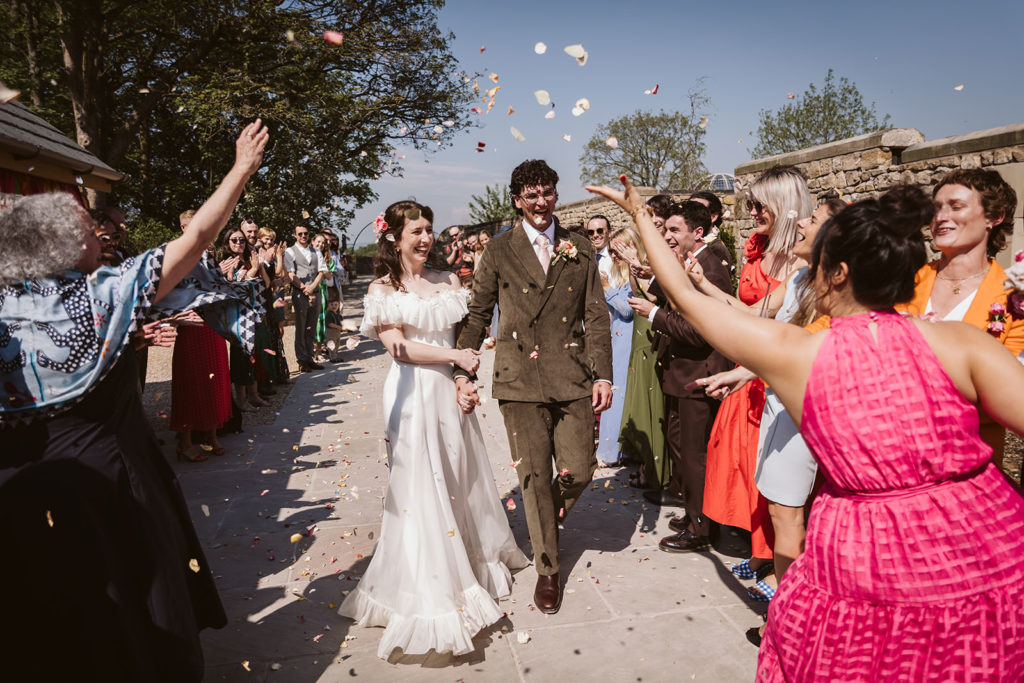 Confetti throw in the sun at Wyresdale Park Weddings