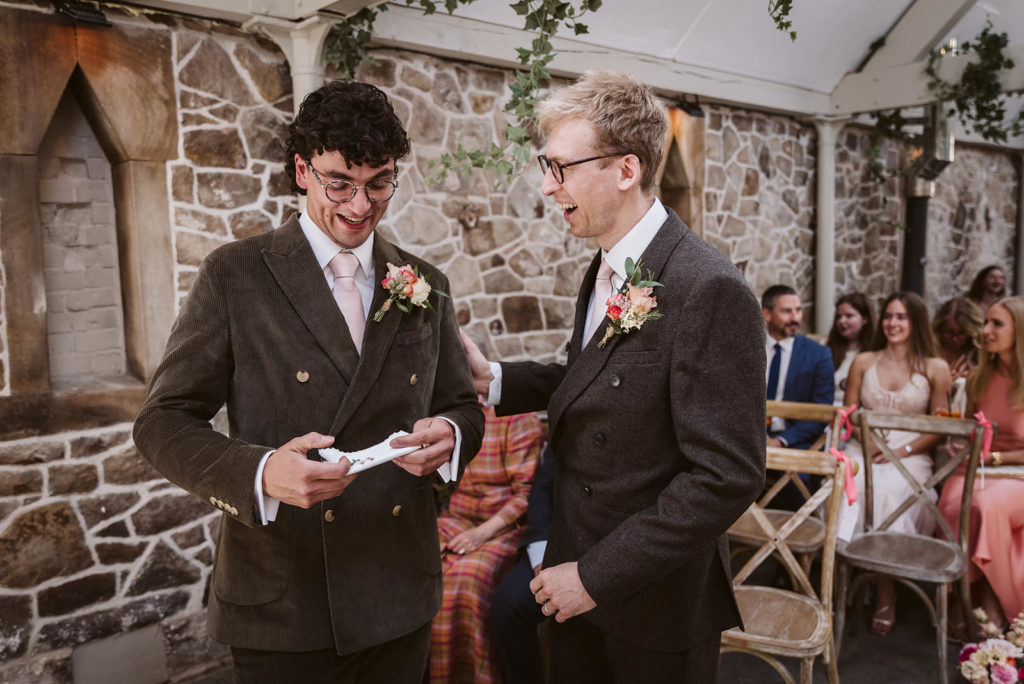 The groom having an emotional moment mid ceremony