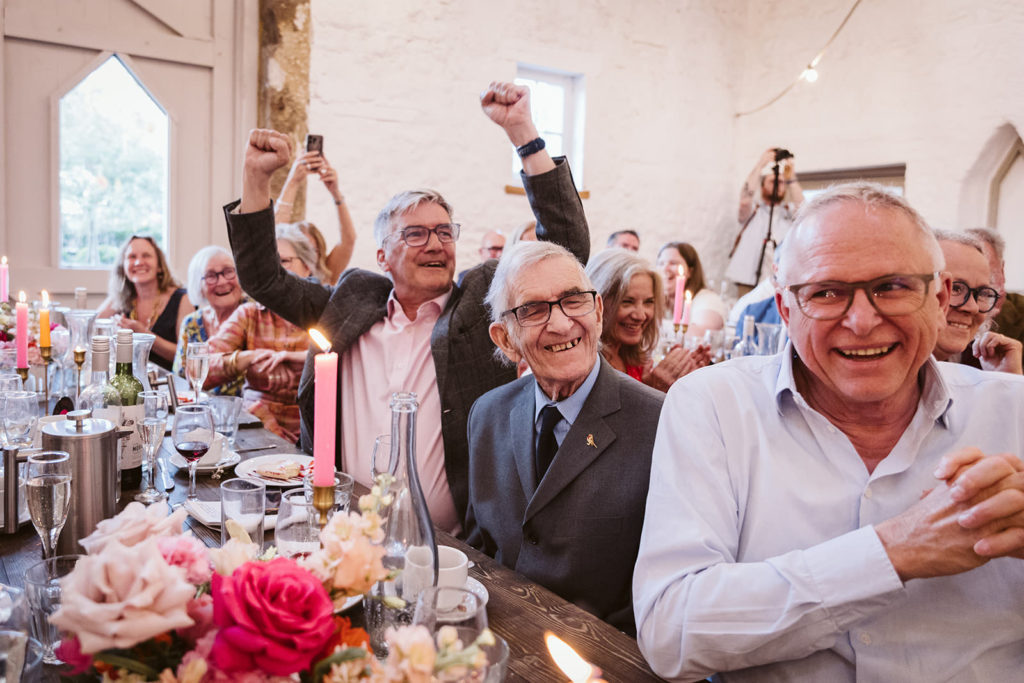 Family members celebrate during the speeches