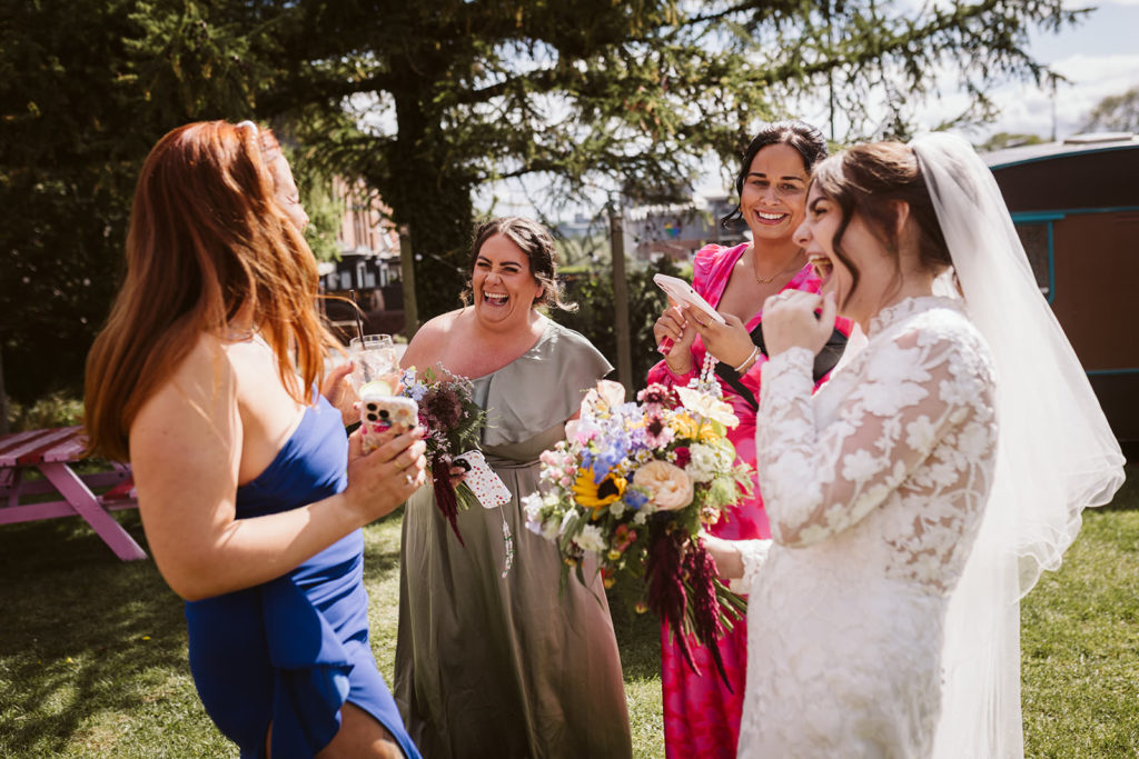 The Bride and her friends share a joke at Left Bank Leeds.