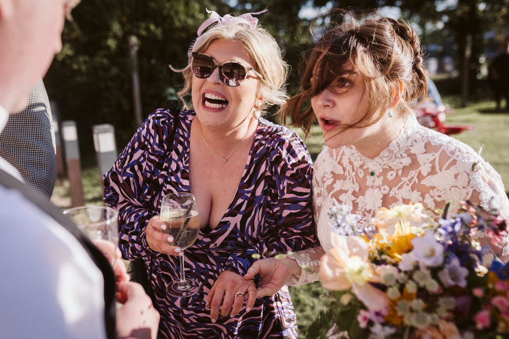 The Bride and a guest share happy news