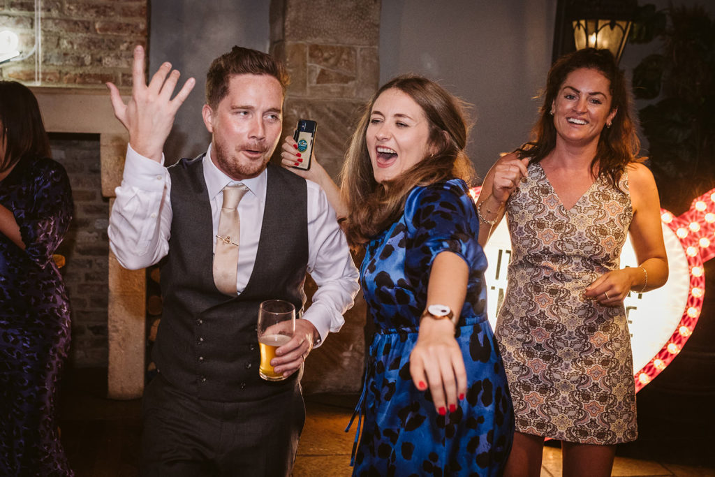 Guests dancing at a wedding in North Yorkshire
