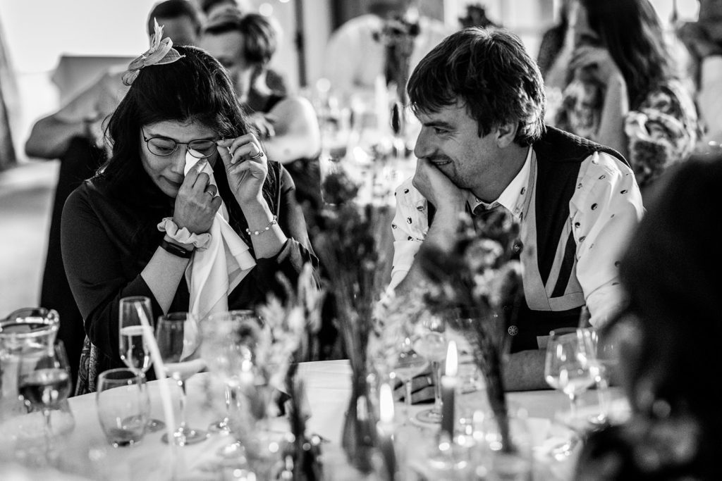 documentary wedding photography guests react to speeches at Hazlewood Castle