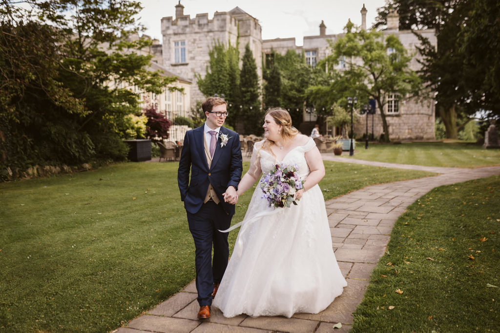 relaxed couple portraits Hazlewood Castle grounds