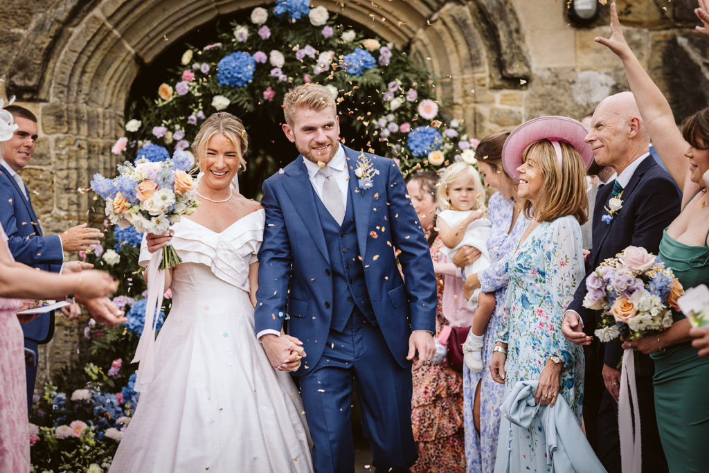 A confetti exit for the newlywed couple from the Church in Coxwold, North yorkshire