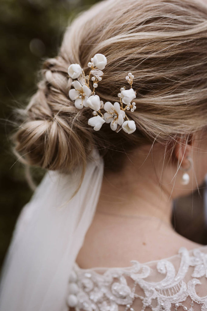 A close up of the bride's hair styling