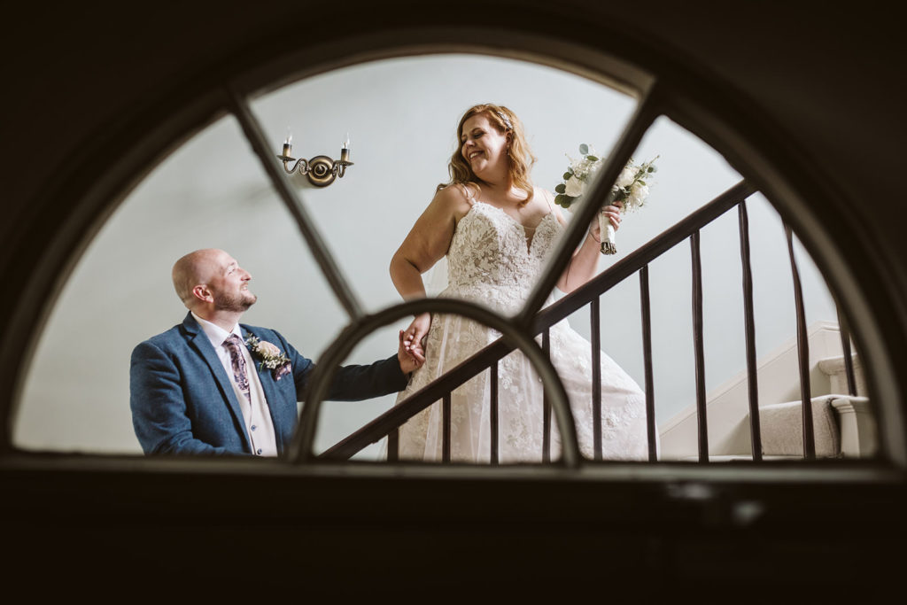 The bride leading her groom upstairs for the evening!