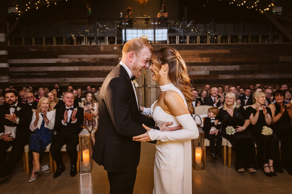 A delighted couple just after their first kiss at Wharfedale Grange
