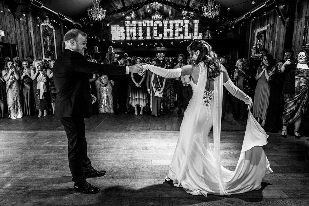 First dance for the newlyweds at this bneautiful barn wedding venue
