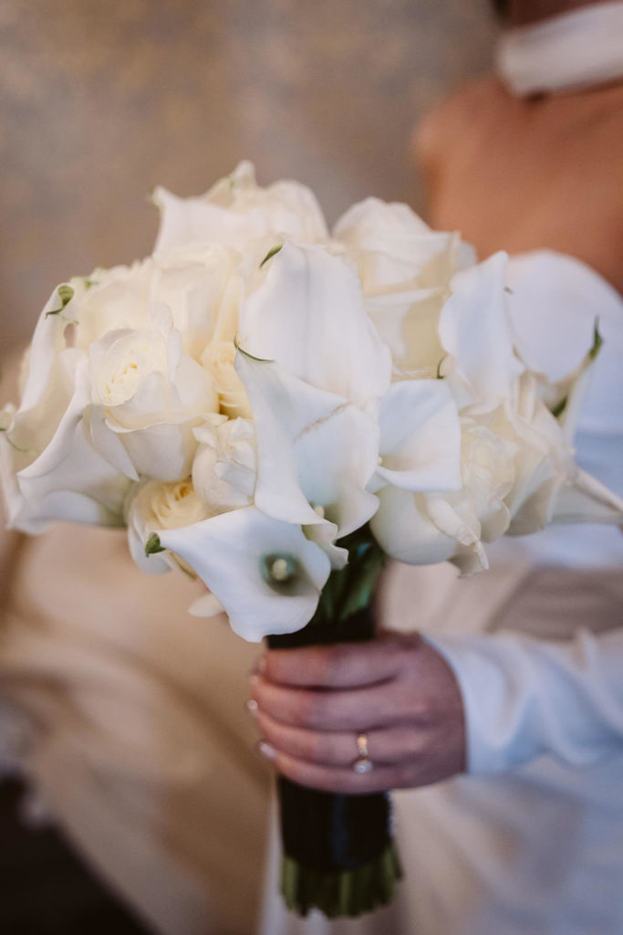 A simple cream bouquet created by the bride