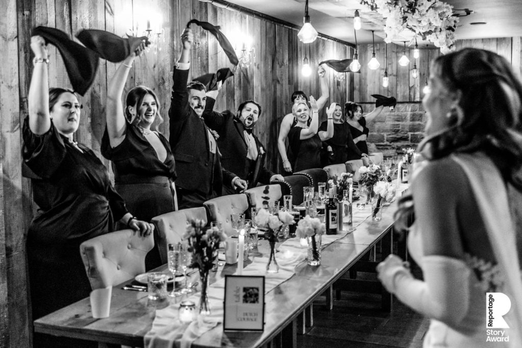 The top table welcomes the happy couple