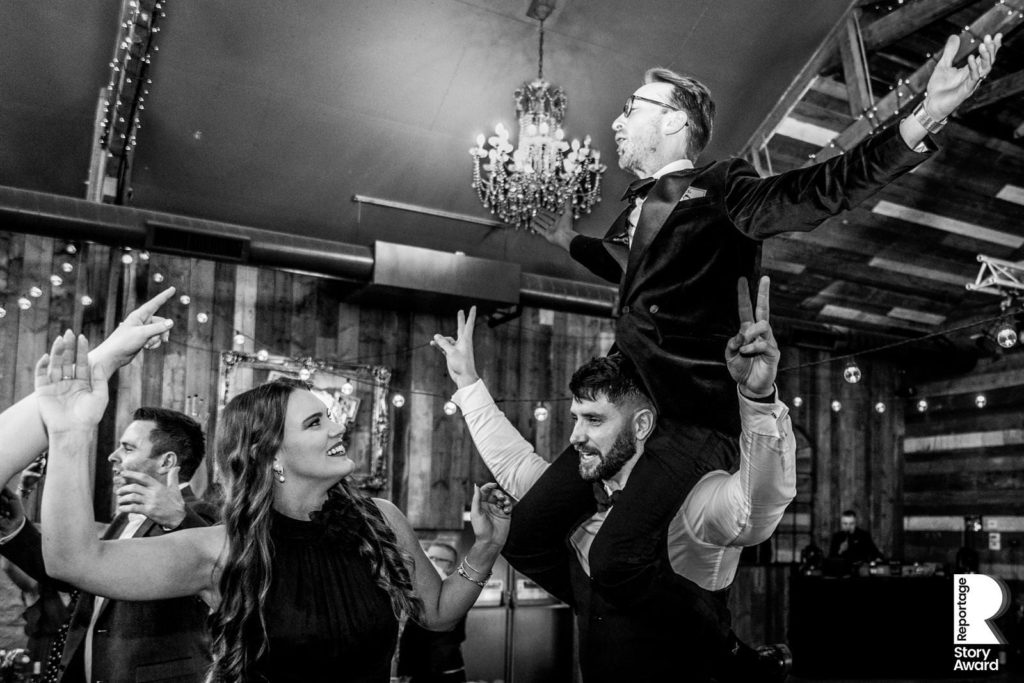 Guests dance during a round of wedding Bongo Bingo
