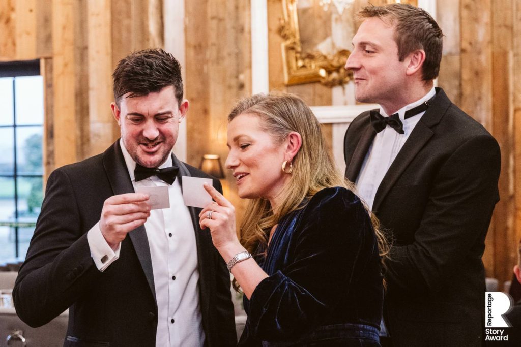 Guests check their name badges