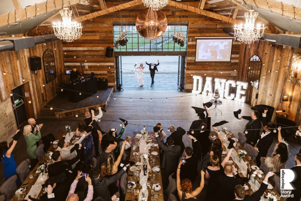 A big entrance for the Bride and Groom into this iconic North Yorkshire Wedding Barn