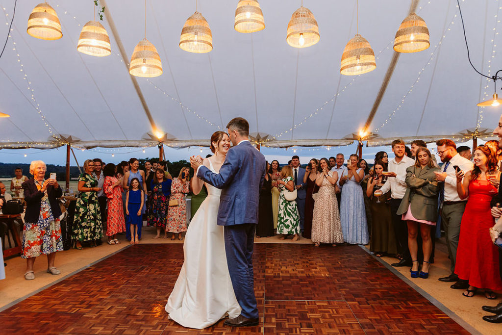 Candid dancing photographs at an Oswaldkirk wedding