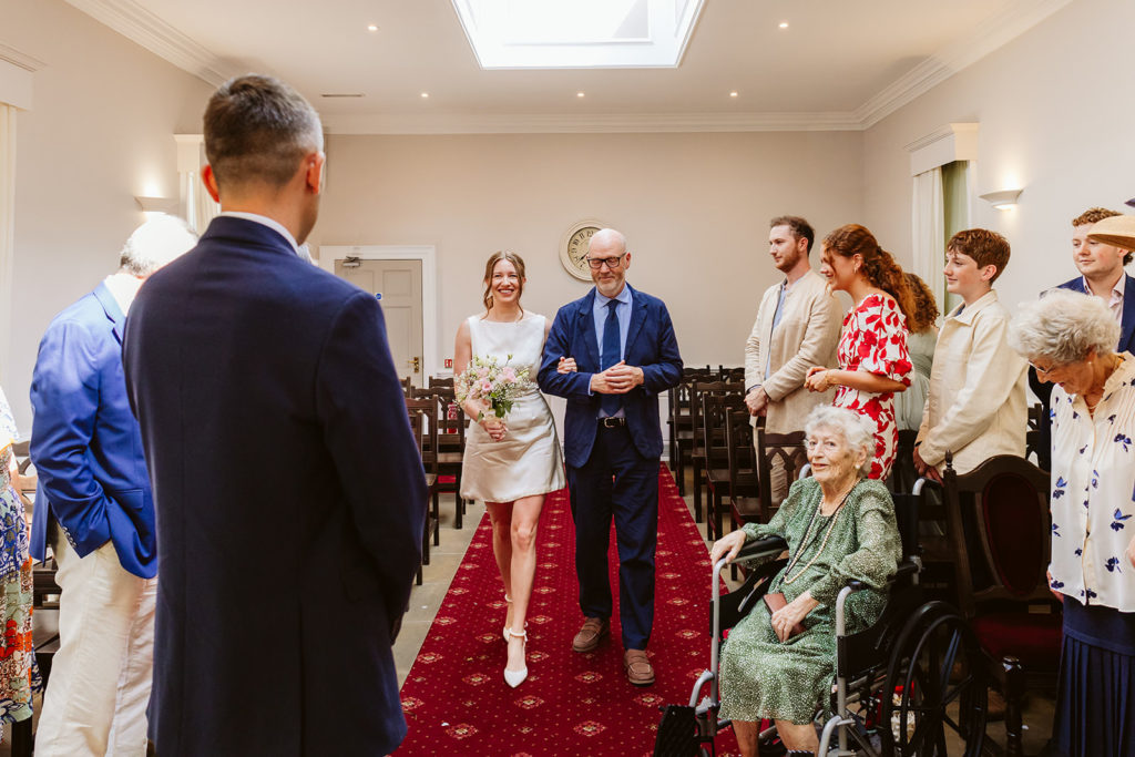 Bride and father arriving for wedding at York Register Office