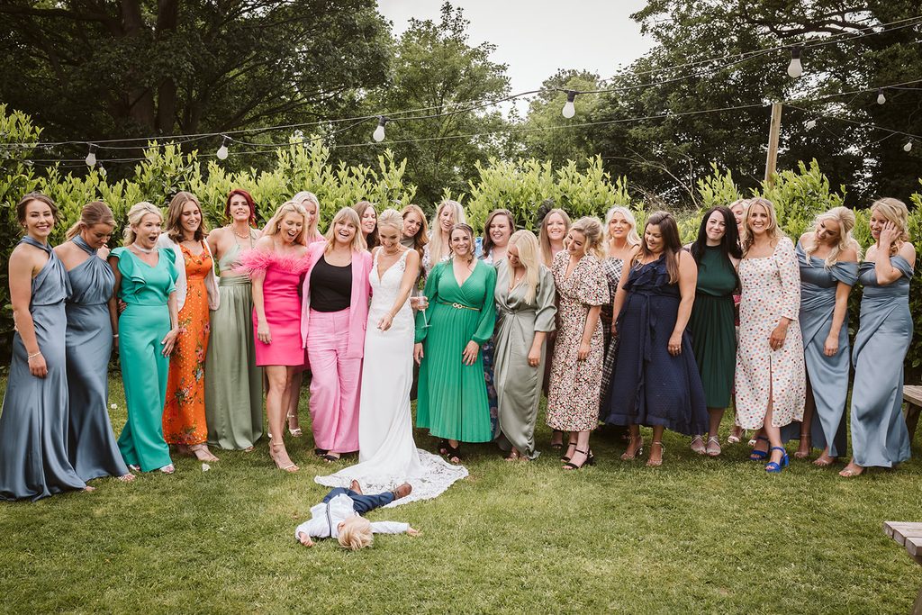 The Bride's son putting his own stamp on the wedding group shot