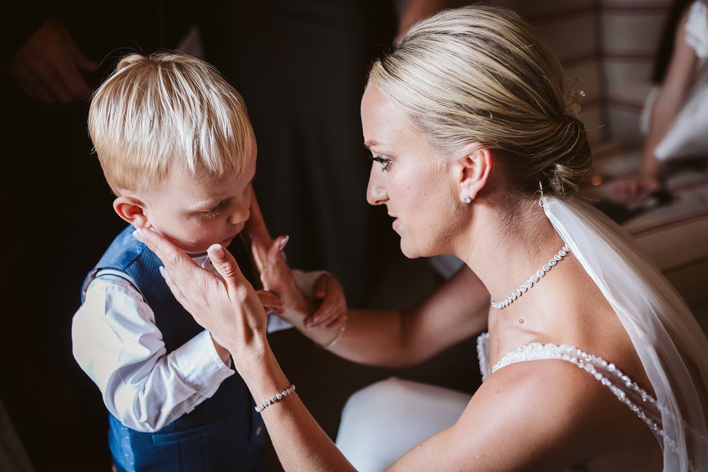 The bride and her son during the bridal preparations